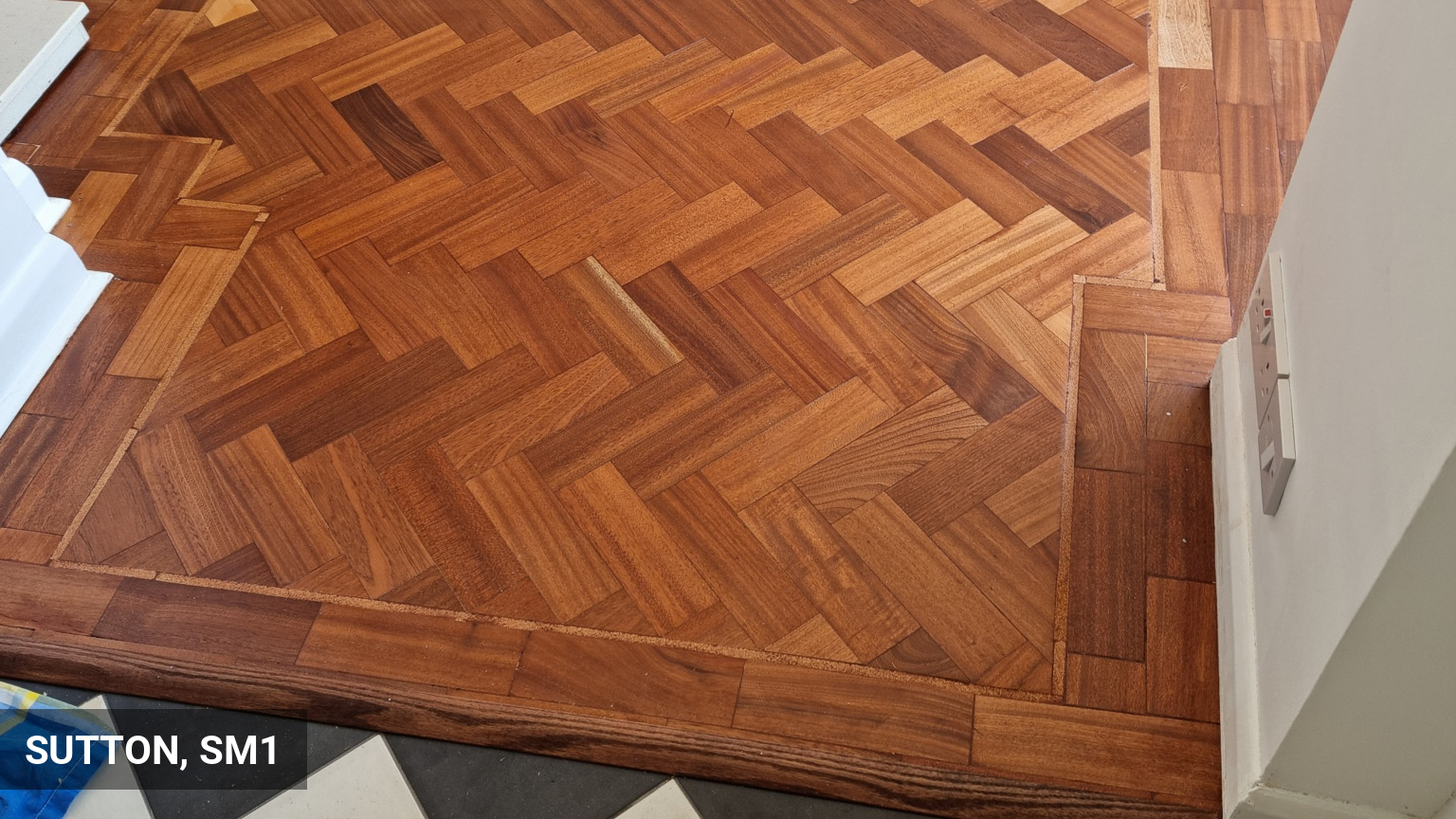 Repairs & Restoration of Teak Parquet Flooring in Sutton, SM1