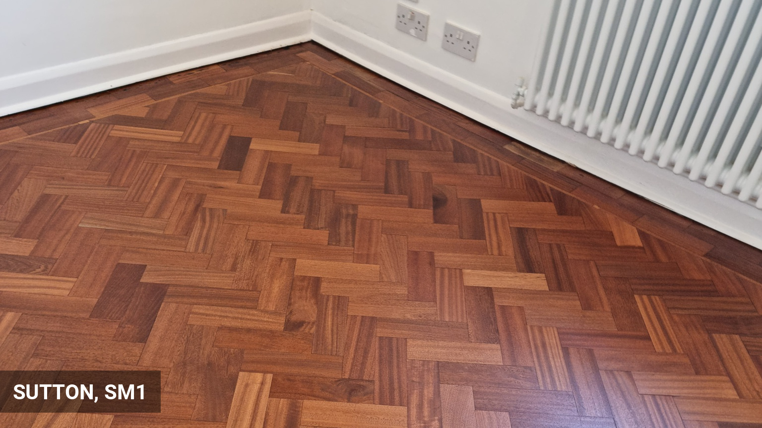 Repairs & Restoration of Teak Parquet Flooring in Sutton