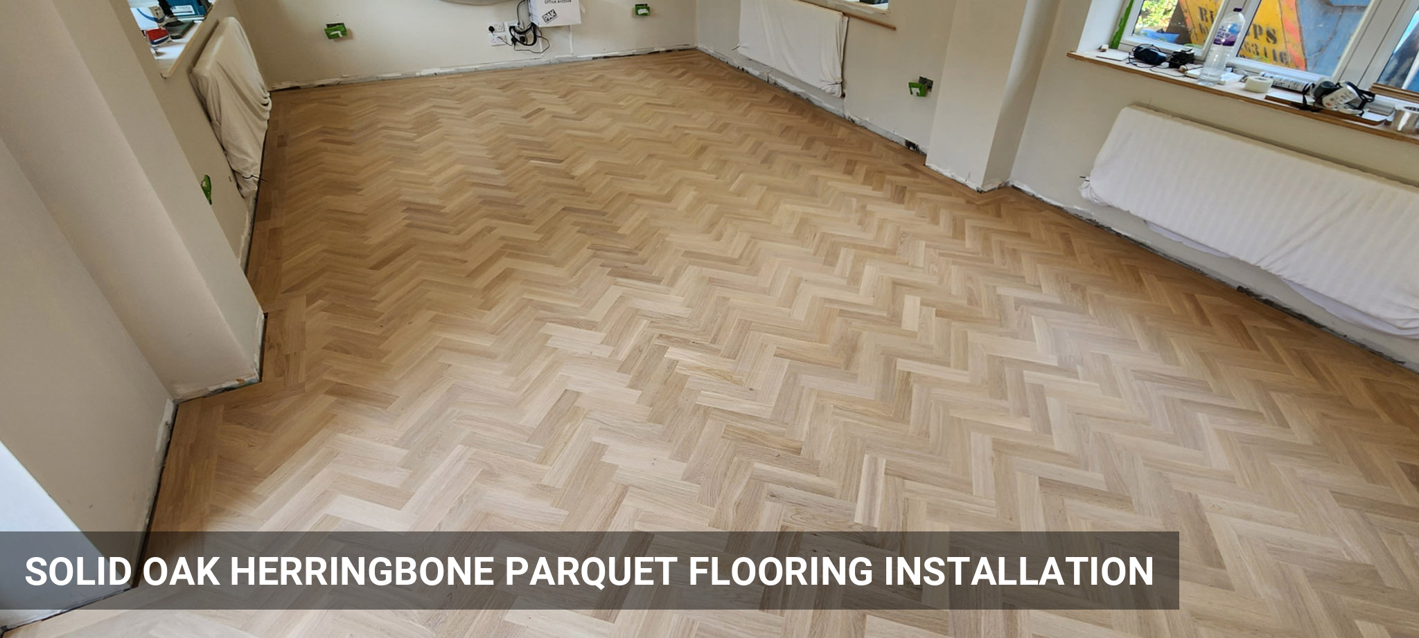 Oak Parquet Floor Installation in Herringbone Pattern with Border in Hemel Hempstead