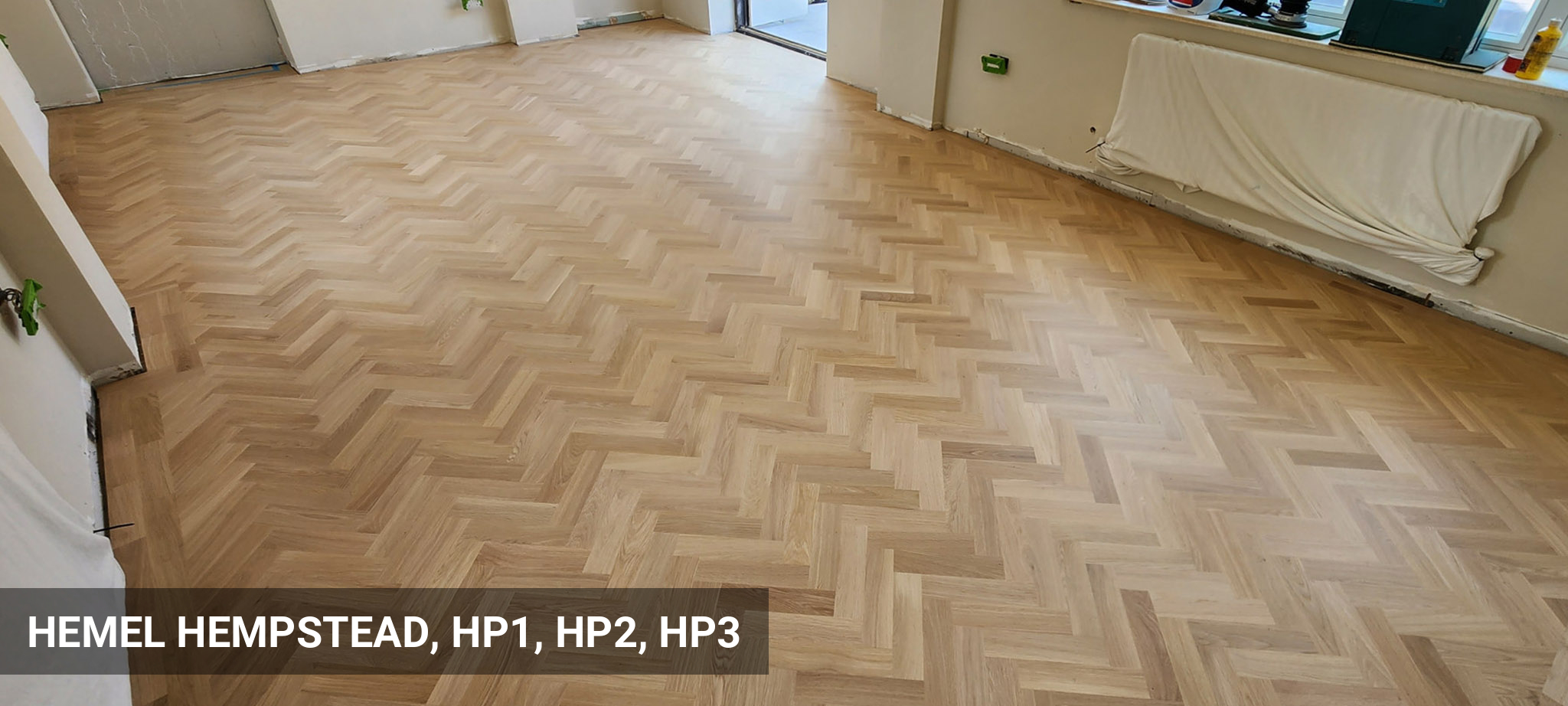 Oak Parquet Floor Installation in Herringbone Pattern with Border in Hemel Hempstead