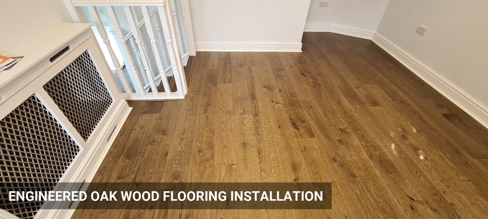 Holt Dorney Engineered Oak Floor Fitting with White Scotia Beading in Brixton