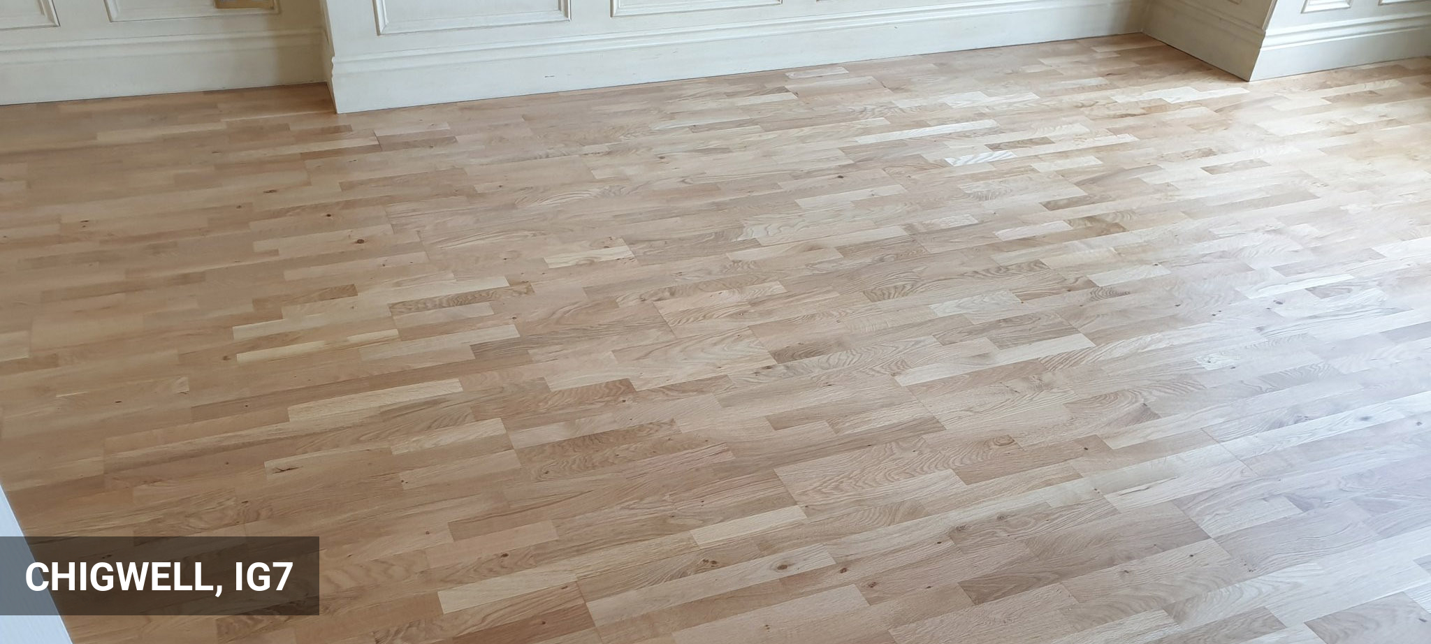 Multi-Strip Oak Wood Flooring Restoration in Chigwell