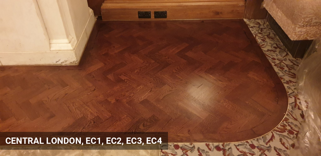 Installation of Parquet Flooring Base for Hotel Reception within Carpets with Brass Border Around in Central London